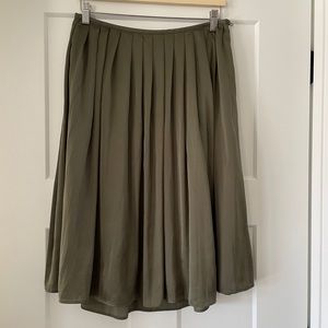 Marks & Spencer: Elegant pleated green skirt